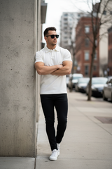 Model leaning with arms crossed