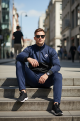 Model sitting casually on urban steps