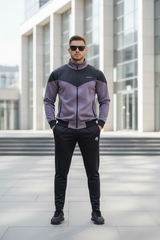 Model standing with hands in pockets