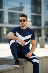 Model sitting casually on ledge