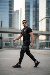 Model walking through urban street